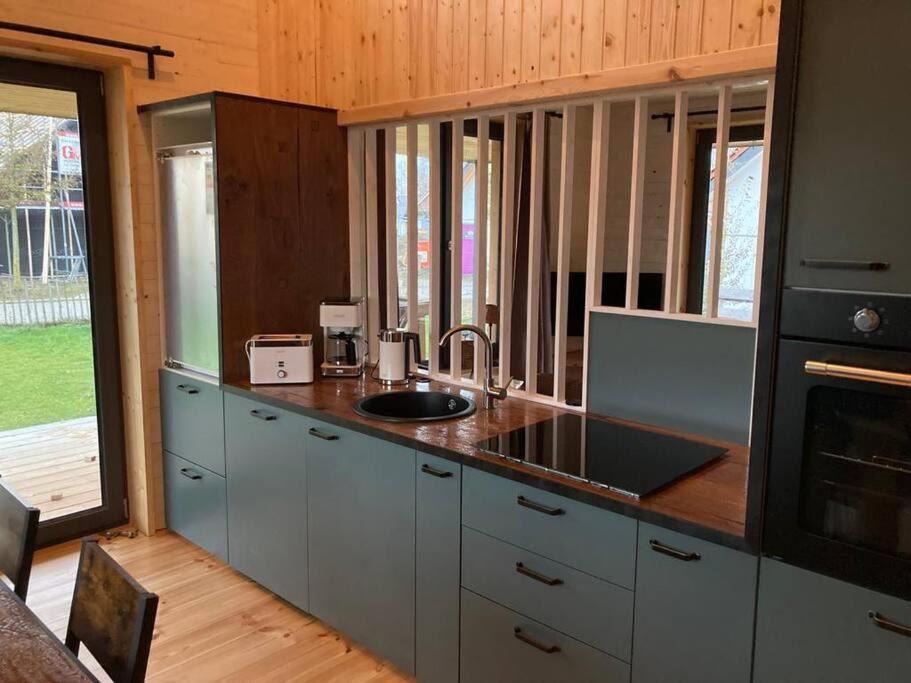 Gemuetliches Holzhaus Am See Warin Extérieur photo